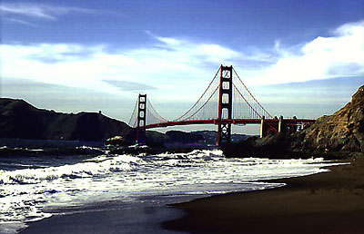 pacific waves in front of a bridge